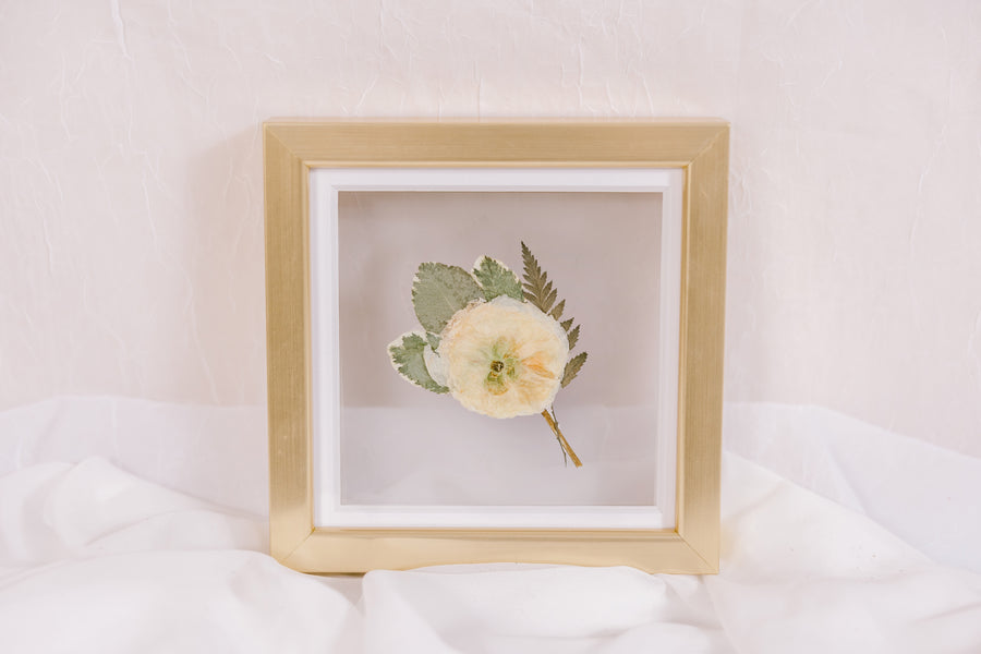 6x6, mini gold wood frame with a pressed boutonniere.
