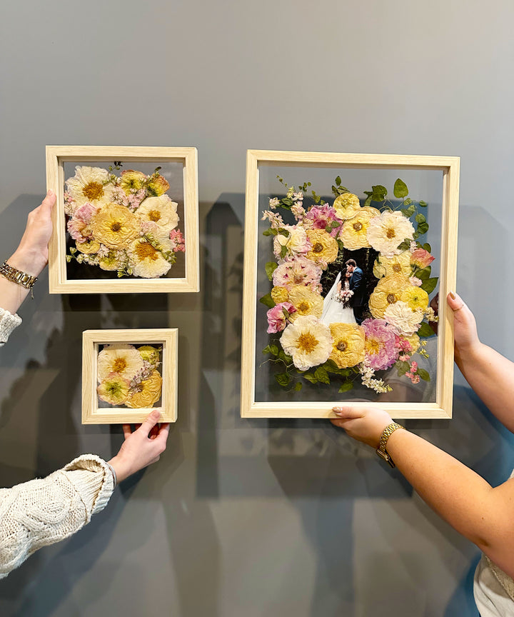 The Gallery Bundle with a wedding picture addition being held on display.