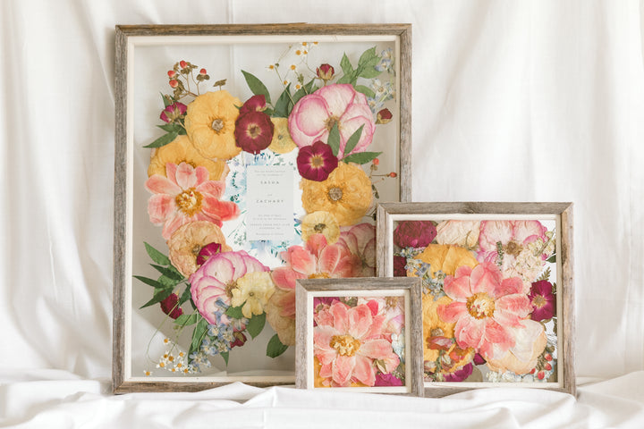 Beautiful colorful pressed flowers in three preservation frame sizes.