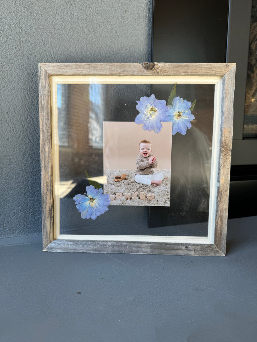 Preserved photograph with pressed flowers from Element Design Co, Element preservation. 