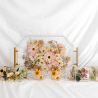 Functional Floral Bundle with geometric serving, square coasters, and hexagon ring holders.