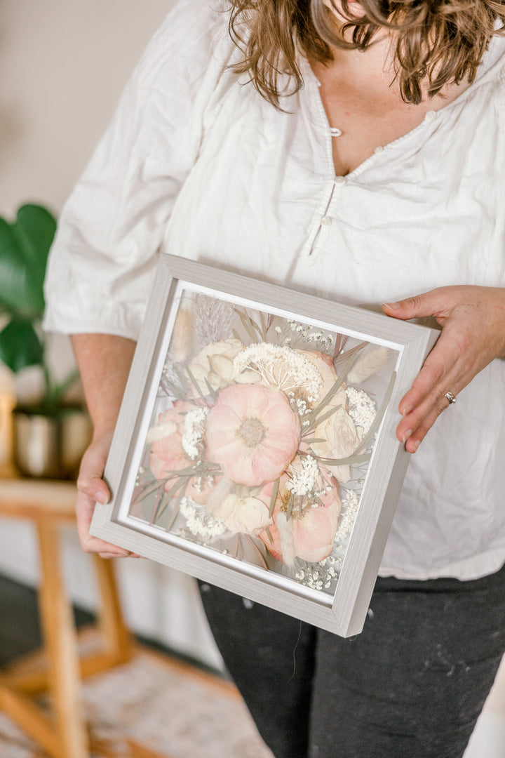 A 10x10 wedding bouquet preservation frame with pink and white pressed flowers - made by Element Design Co, Element Preservation, Pressed Bouquet Shop
