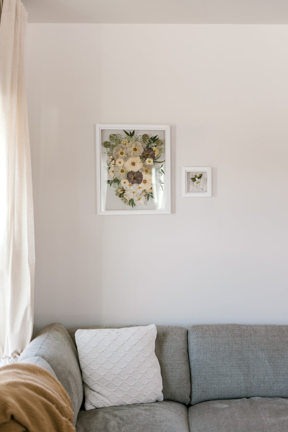 A 16x20 frame with a 6x6, mini frame makes up the Classic Bundle hung up on the wall.