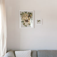 A 16x20 frame with a 6x6, mini frame makes up the Classic Bundle hung up on the wall.