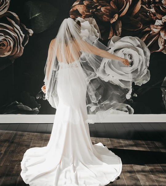 Dressed in Love's bride wearing her wedding gown