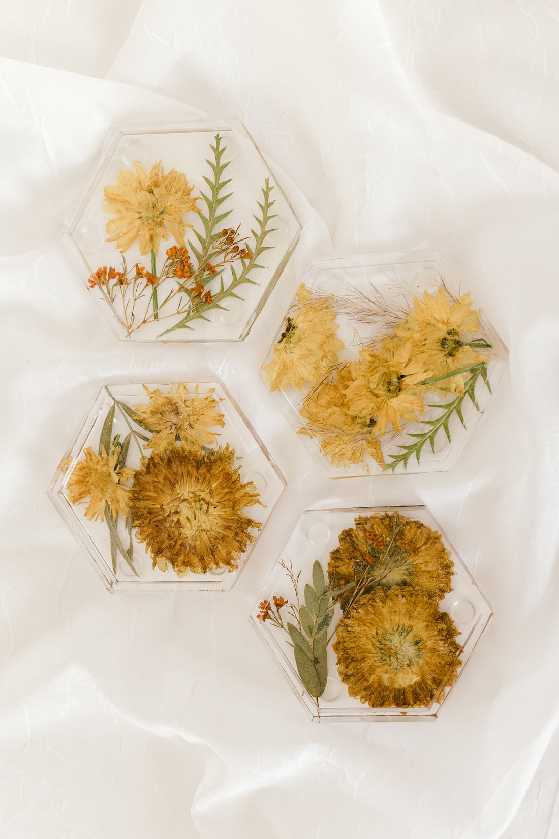 Hexagon shaped resin coasters filled with beautiful wedding bouquet flowers 