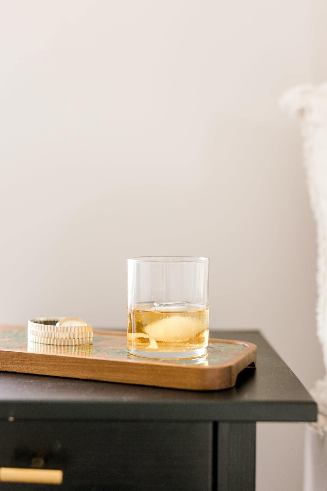 Showcasing wooden resin tray on night stand